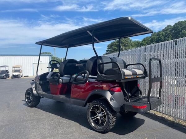 2023 Club Car® Onward® Lifted 6 Passenger Gas Candy Metallic Red - Image 4